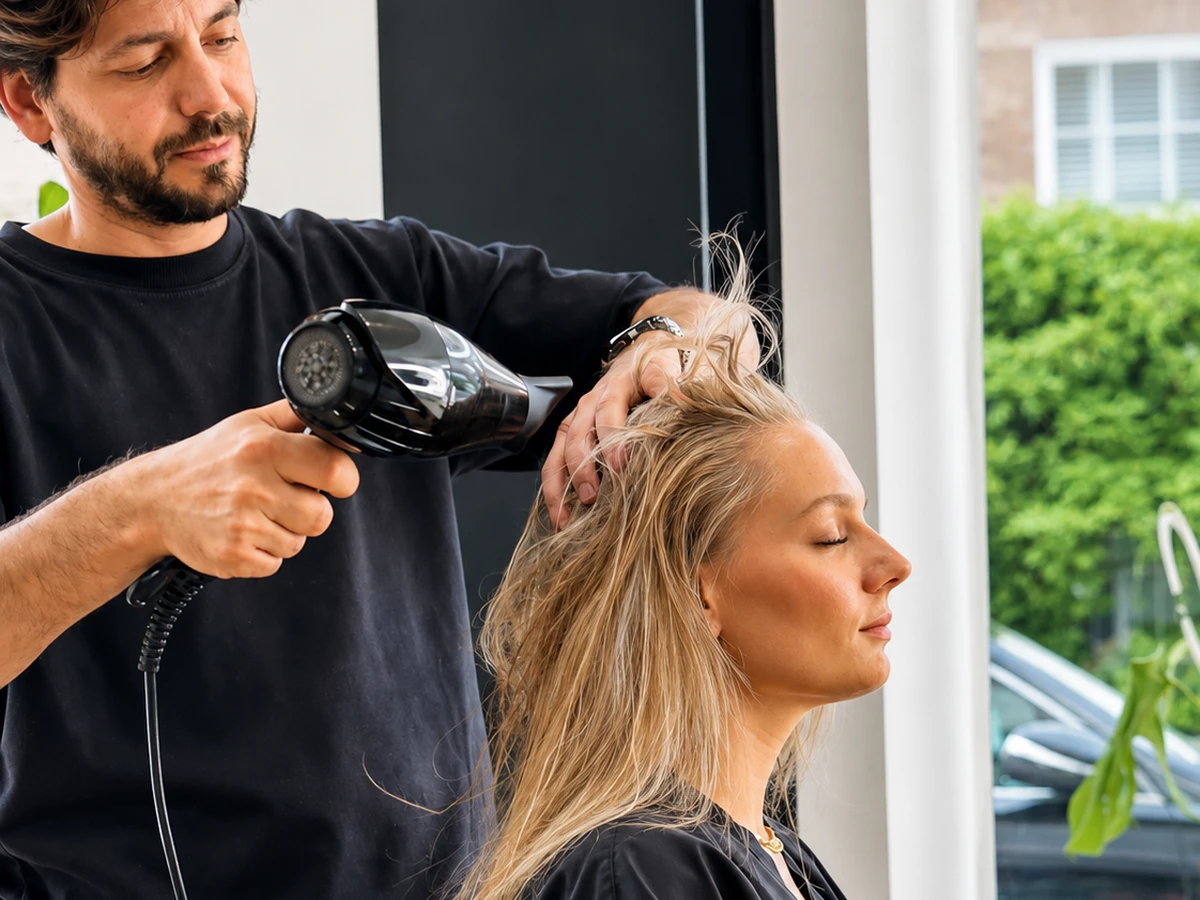 Oray Oz blow drying a client at OREL Hair and Beauty, Knightsbridge